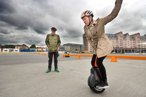 Woman riding airwheel electric unicycle